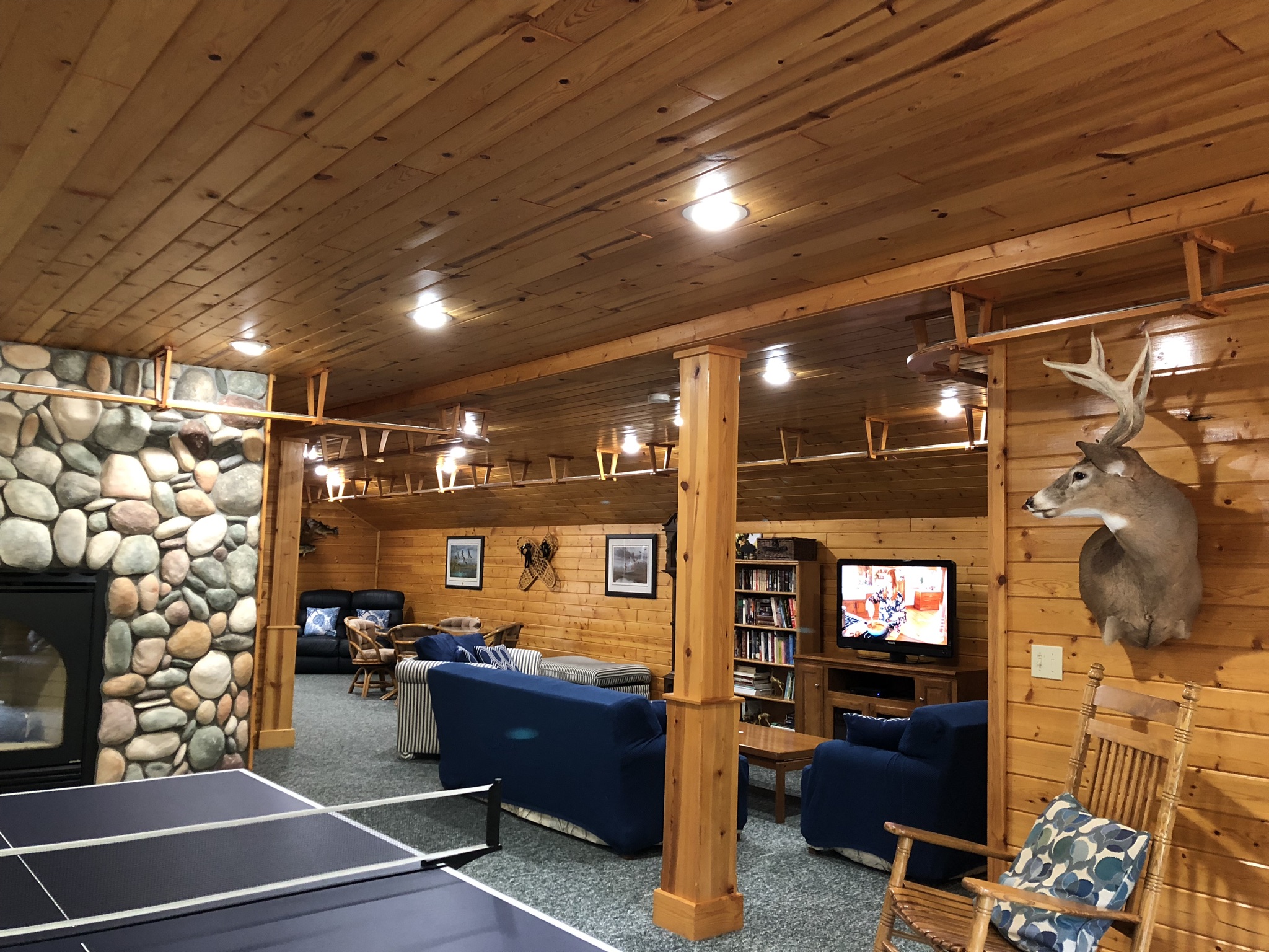 Seating area with cable TV at Torch Lake Lodge. All areas have high speed internet.